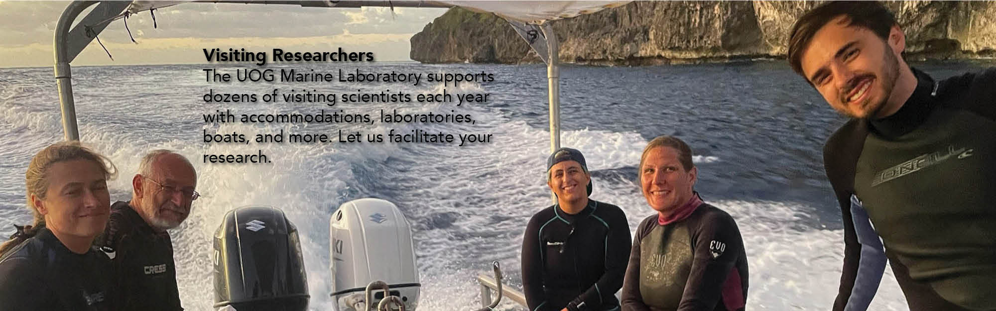 Visiting researchers returning to shore.