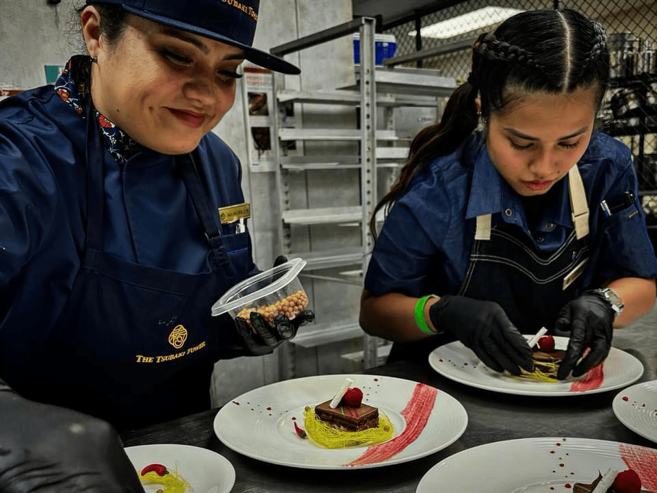 Tusbaki Tower team members plate desserts during the 2025 Maila Ta Fan Chesa event held at the Hyatt Regency Guam.