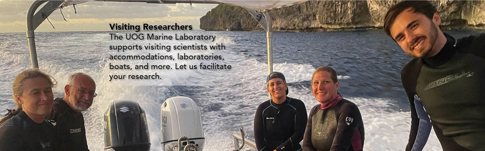 Visiting researchers returning to shore.