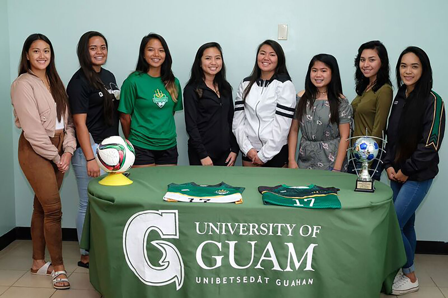 The University of Guam Women’s Soccer Team signed 8 returners from the 2016-17 Guam Football Association Women’s League (Division II) Spring Champions to Athletic Letters of Intent and partial tuition scholarships to play for the Lady Tritons in 2017-18.  Aiyana Shedd played high school soccer at the Academy of Our Lady and won a Junior Achievement award in 2015 while attending Academy. Shedd was a “Green Club” member of the UOG Athletic Academic Clubs (3.50 GPA to 3.99 GPA) in 2016-17.  Koholali’i Maertens attended Hilo High School in Hawaii all of her high school years. She was captain of her high school soccer team as a senior. Koholali’i was named 2nd Team All-Island as a freshman through her junior season and was 1st Team All-Island as a senior. Her high school team won the State Championship when she was a freshman and Hilo went to the state playoffs all four years Maertens played. She was in Key Club (an academic club) from her 7th grade year until she was a junior. Maertens was a track star at Hilo High School as well, winning the state 400 meter dash as a junior and 4X4 Relay and 4X1 too. Hilo was state track champions during her junior and senior years. She also won the state discus throw her senior year.  Elisha Benavente played high school soccer at Harvest Christian Academy where she was captain of the team as a senior and was 2nd Team All Island as a junior. She was an A/B Honor Roll student during her junior and senior years and was captain of the girl’s basketball team as a junior and senior. Elisha scored both goals in UOG’s 2-1 win over Select Care/ISC Team Slay in the Championship Match of the Guam Football Association’s Women’s League (D2).  Aiesha Castro played for George Washington High School where she was named 2nd Team All Island as a senior and on the All-Defensive Team. She was on the winning team for the All-Island All-Star game as a senior as well. George Washington finished in the Top Four teams on the island each year of her high school career and won the 2014 and 2016 Pre-Season Tournament for the Guam Football Association. She was an Honor Roll student from her freshman year through her senior year.  Philana Lopez played for St. Paul’s Christian School where she was captain of the team from her sophomore season through her senior year. As a senior she was named Honorable Mention All-Island. She won two championships as a club team member of Quality Distributors Women’s Team. In high school, Lopez was a National Honor Roll Society of Scholars member. She was also a member of the Guam National Team as a U13 and U14 player.  Shaeina Torres played at Simon Sanchez High School where they finished 3rd on the island as a senior. Torres won multiple championships in the Robbie Webber League playing for several club teams including the Crushers, Islanders and Dededo Soccer. She was named captain of the girl’s basketball team at Simon Sanchez from her freshman year until her senior season. Torres has been a Regent Scholar for every semester she has attended UOG and was a member of the Triton Athletic Academic Clubs as a “Triton” (4.00 GPA Club). She was voted the Most Valuable Player on the UOG Women’s Soccer Team in 2016-17 and was named the “Student-Athlete of the Year” at UOG for 2016-17.  Adrianne Flores played high school soccer at St. Paul’s Christian School as both a middle schooler and in high school. She played for the Islanders club team as a youth and was the Junior Golf Club Champion. She was a Honor Roll member in high school and also played volleyball and golf at St. Paul’s.  Ashley Borja attended the Academy of Our Lady for high school and was a member of the Quality Mom’s club team and the Southern Cobras. She was a Dean’s List student in 2014 and Psych Club Officer. She was a Unity and Diversity Award recipient and was a Triton Athletics Academic Club member at the “Green Club” level (3.50 GPA to 3.99 GPA). Borja was also captain of the Academy’s softball team and finished 3rd in softball on the island as a junior and senior.  The Lady Tritons were 4-2-0 last spring season when they won the GFA Women's League (D2) Championship and went 6-0-0 playing in the GFA Women's 7 On 7 League during the Fall of 2016.