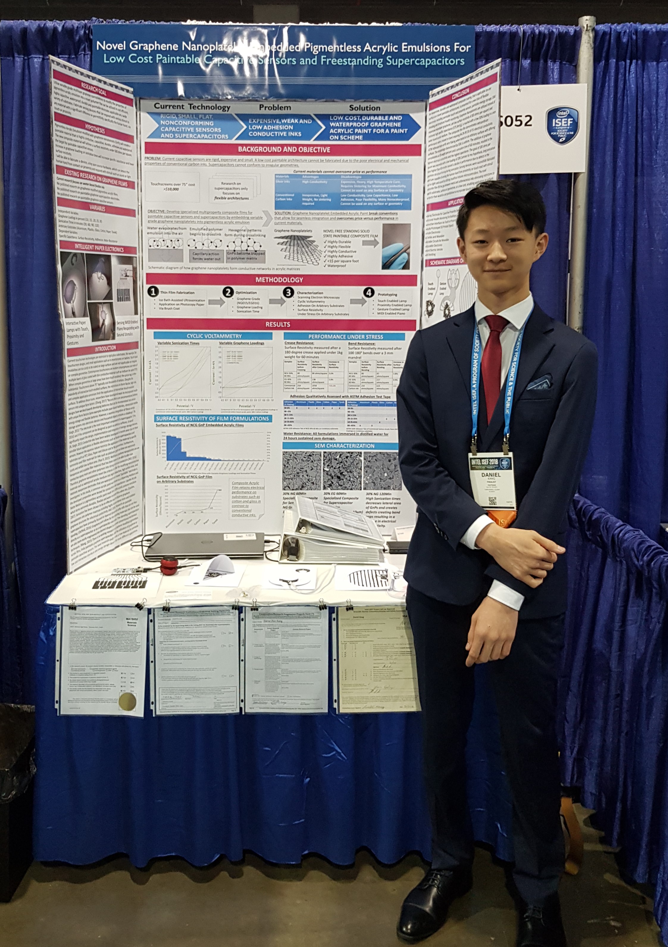 Daniel Kang standing next to his award-winning project at the Intel International Science and Engineering Fair in Pittsburgh, Pennsylvania last week.