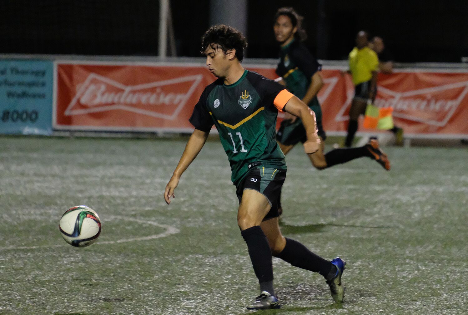 UOG Men's Soccer Captain Dylan Naputi takes the ball down field