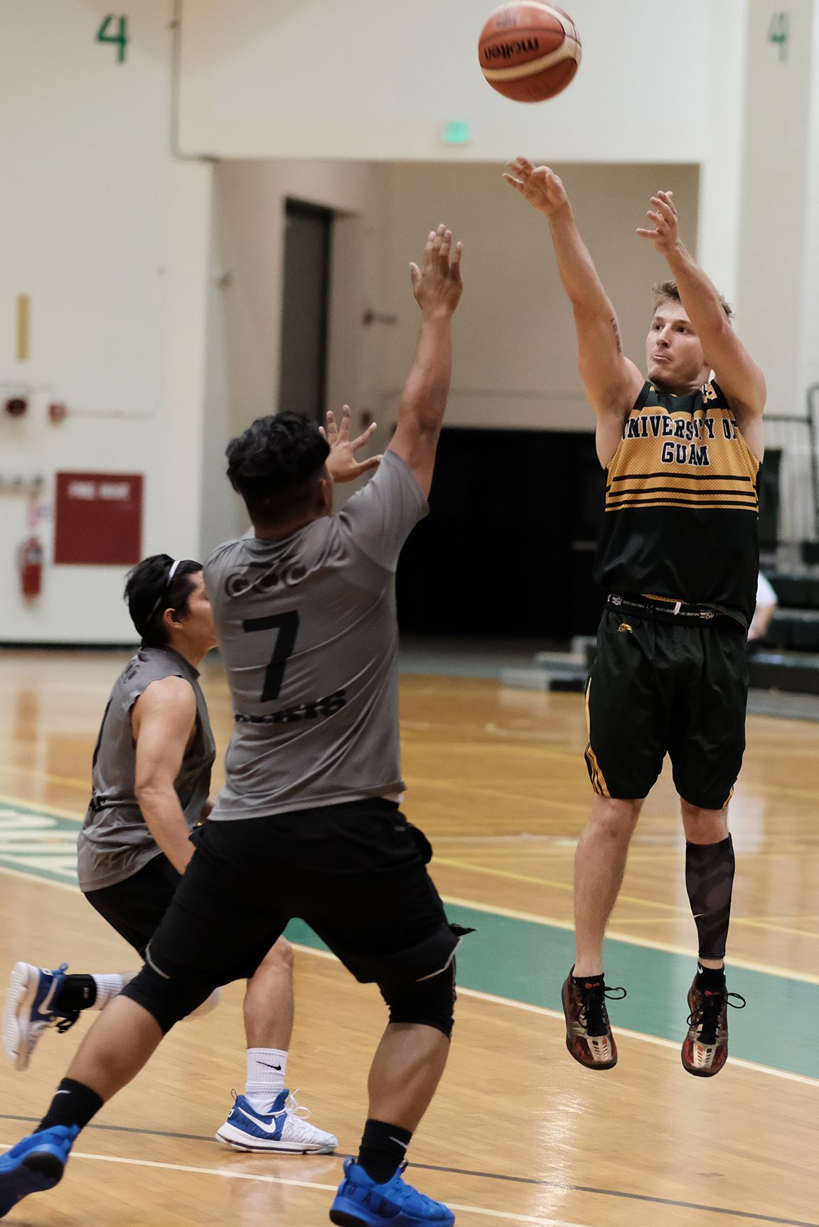 Logan Hopkins takes a shot in a matchup against Guam Community College last year.