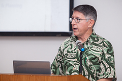 President Thomas W. Krise addresses faculty at the start of the Fañomnåkan 2019 semester.