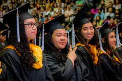 UOG Graduates smiling for the camera