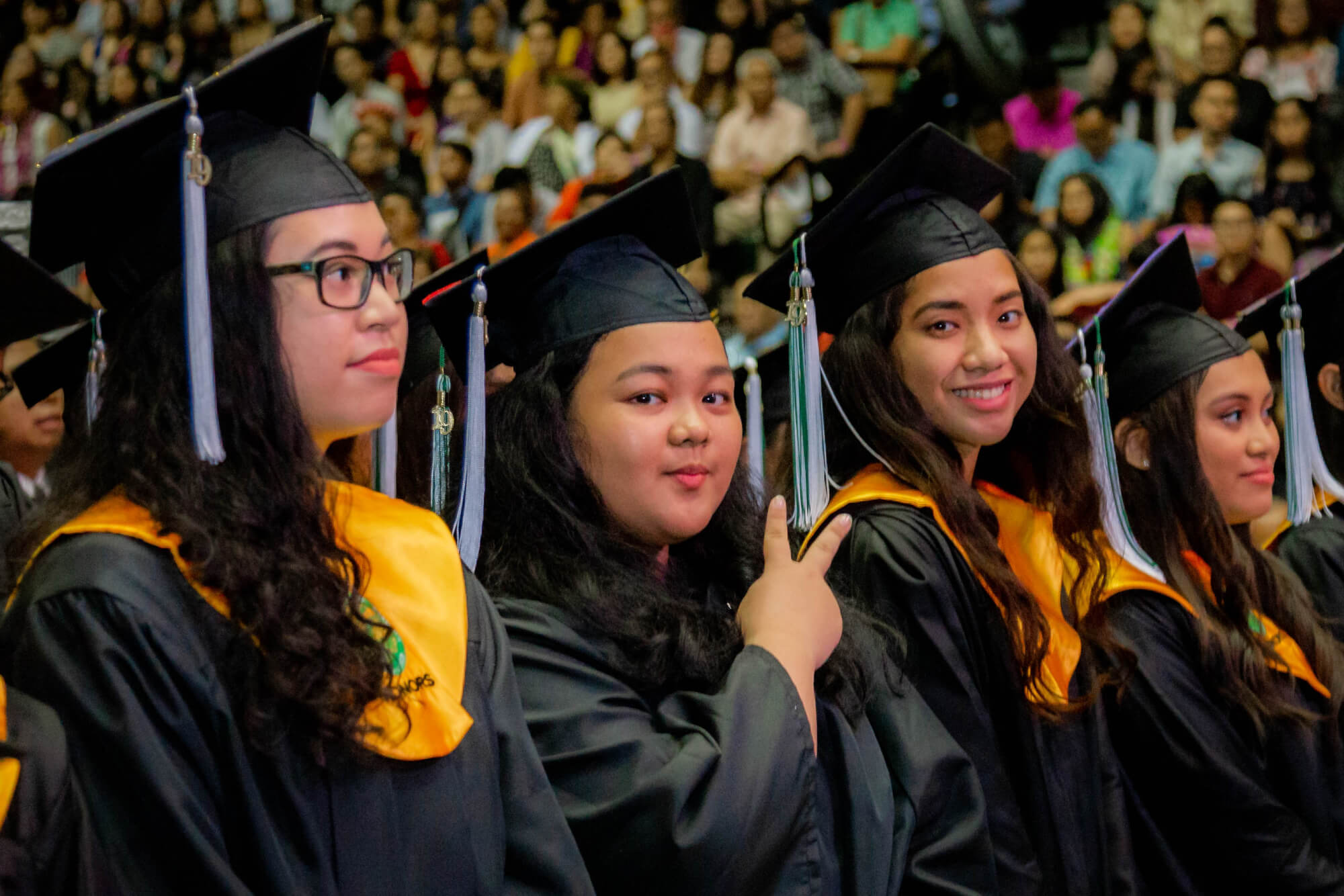 Communication graduates, Sophia Madelambayan, Therese Martinez, Audrey Meno, and Shannon Ada