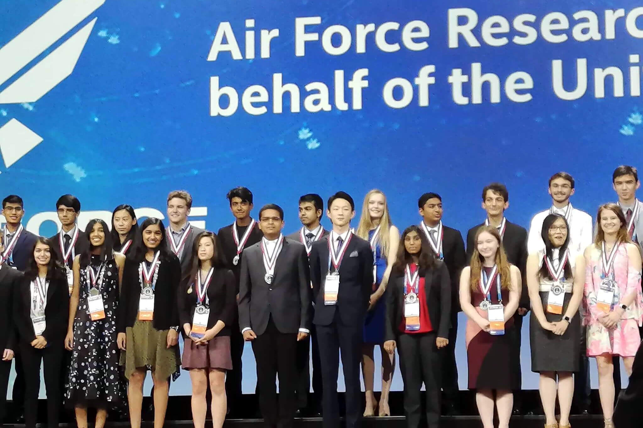 Daniel Z. Kang stands with other winners at the Intel International Science and Engineering Fair