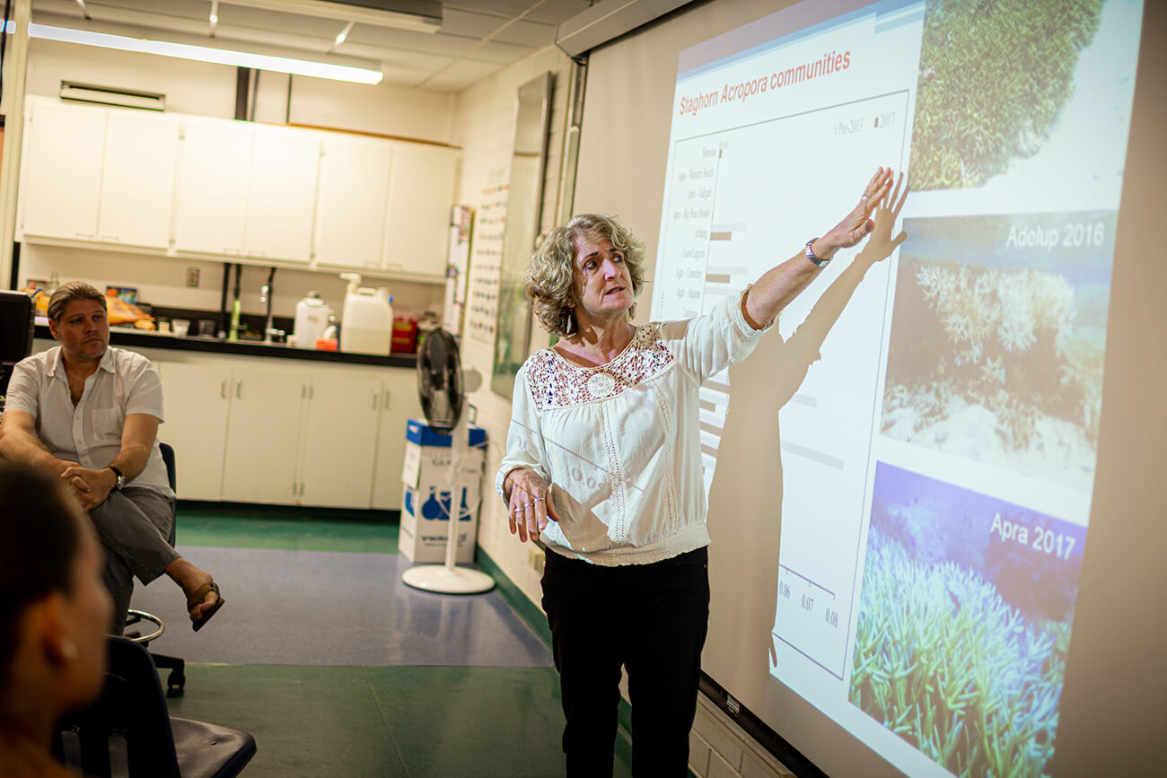 Laurie Raymundo presents newly published research on Guam's coral reefs to media on July 29.