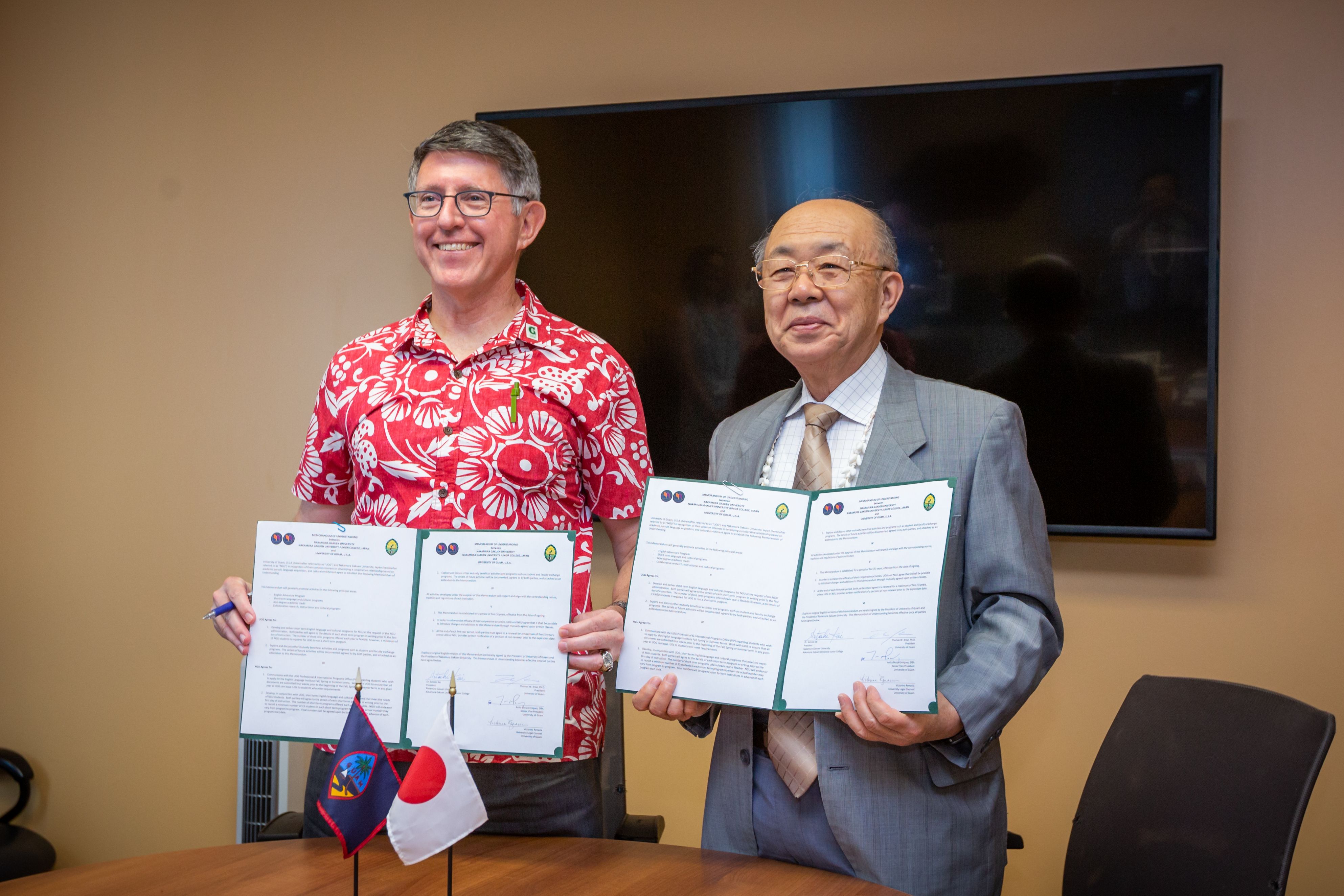 (From left) University of Guam President Thomas W. Krise and Nakamura Gakuen University President Satoshi Kai. 