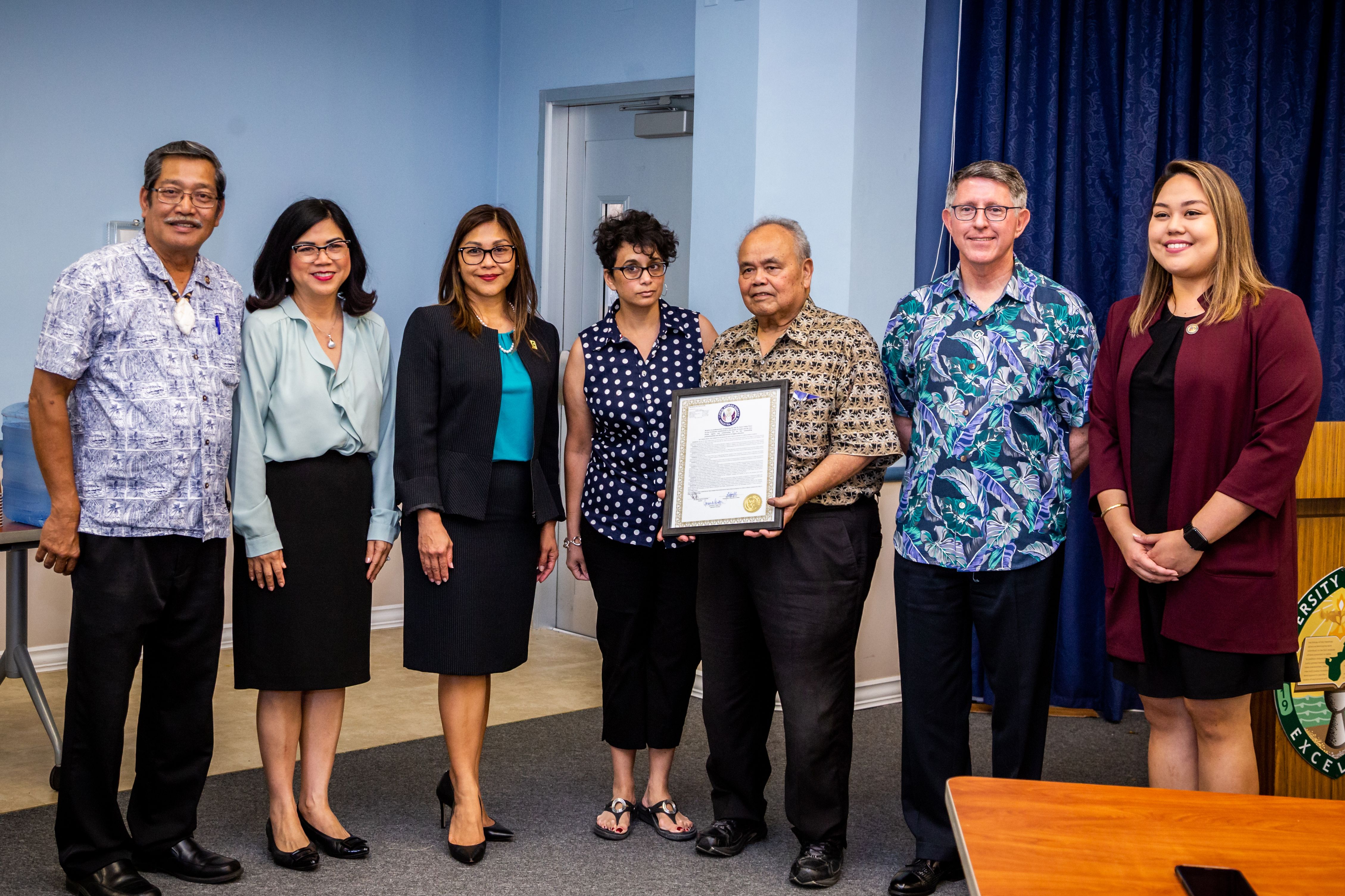 Sen. Joe San Agustin; UOG Senior Vice President of Academic Affairs Anita Enriquez; School of Business & Public Administration Dean Annette Santos; Sherry Roberg-Perez, stepdaughter of Karri; Gerry Perez, husband of Karri; UOG President Thomas W. Krise; and Sen. Amanda Shelton