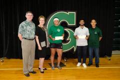 The University of Guam presented two $1,000 scholarships on Oct. 28, 2018, to two UOG Triton soccer players