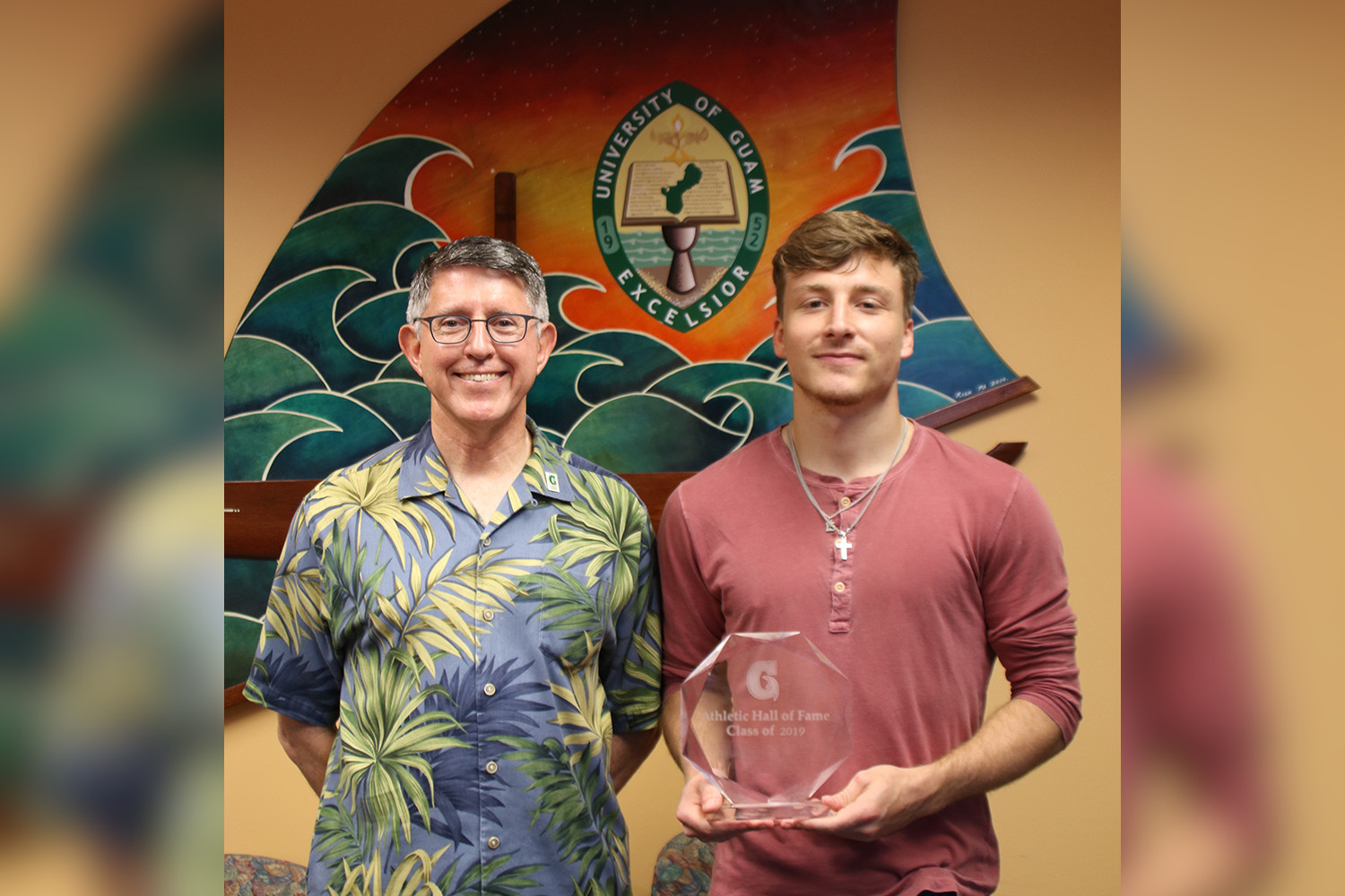 President Thomas W. Krise with Logan Hopkins, the Student-Athlete of the Year 