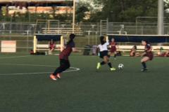 The University of Guam Lady Triton's Soccer Team dominated the Bank of Guam Lady Strykers with their speed and footwork