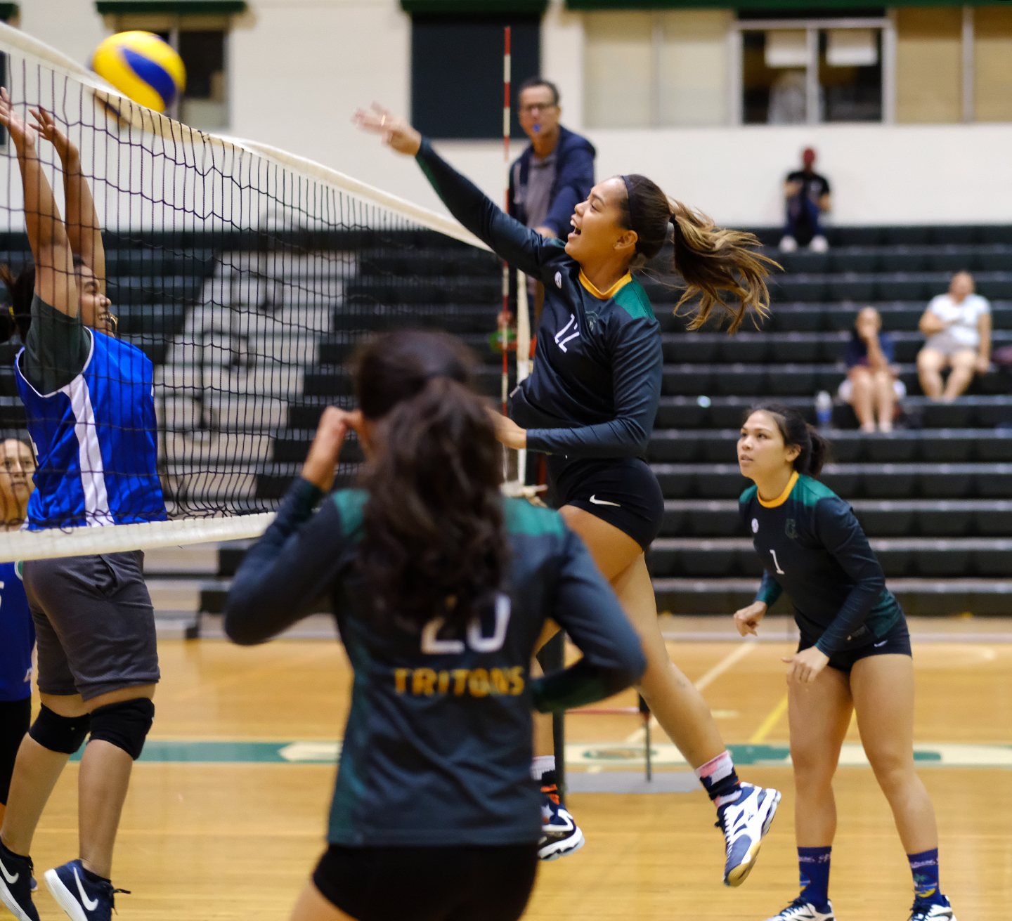 Taisipic spikes the ball in a match against the UOG Tridents on Sept. 27.