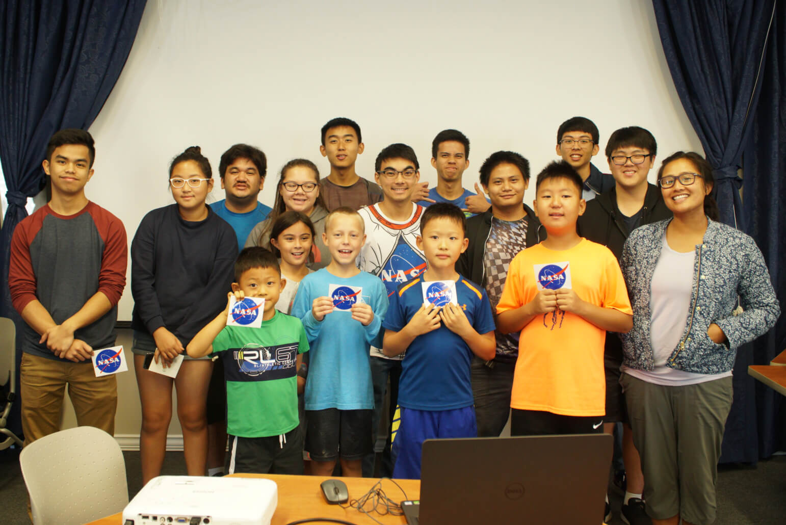 Participants with instructor Evan Kawamura, and Romina King, director of the UOG PICASC