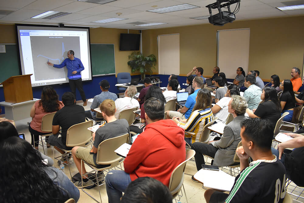 Carlos Madrid, presents his research at the 40th Annual Research Conference