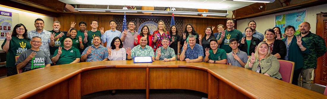 Members of the University of Guam community at the governor’s complex