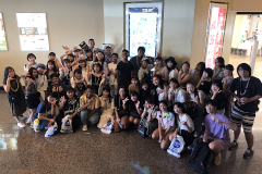 UOG students and Otakanomori High School students particpiating in a photo scavenger hunt in Tumon.