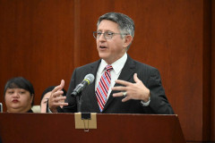 Thomas Krise delivering the keynote address to newly naturalized citizens