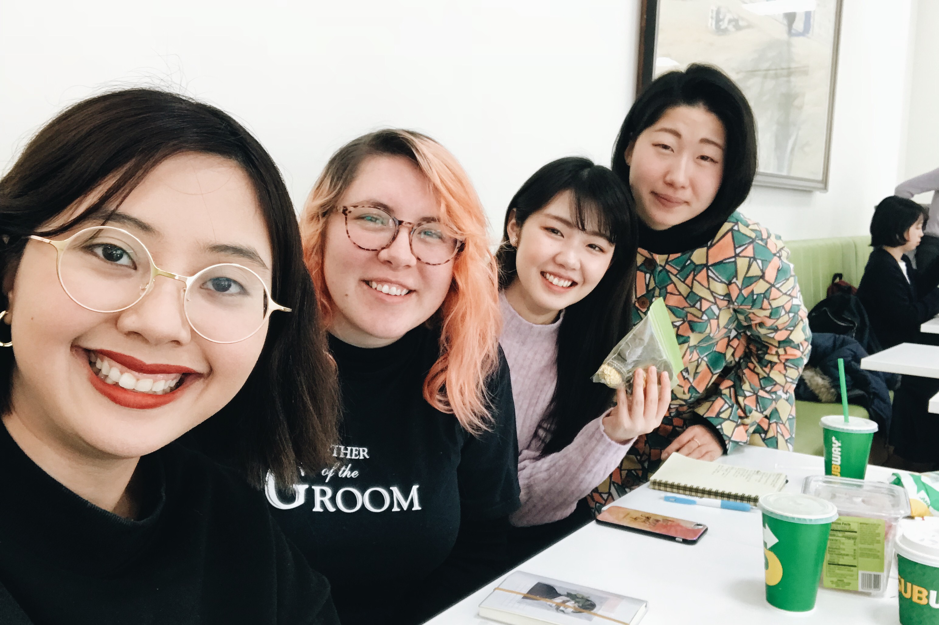 Tuazon, left, at a prayer breakfast with fellow exchange and Japanese students.