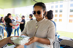 Students handing out meals