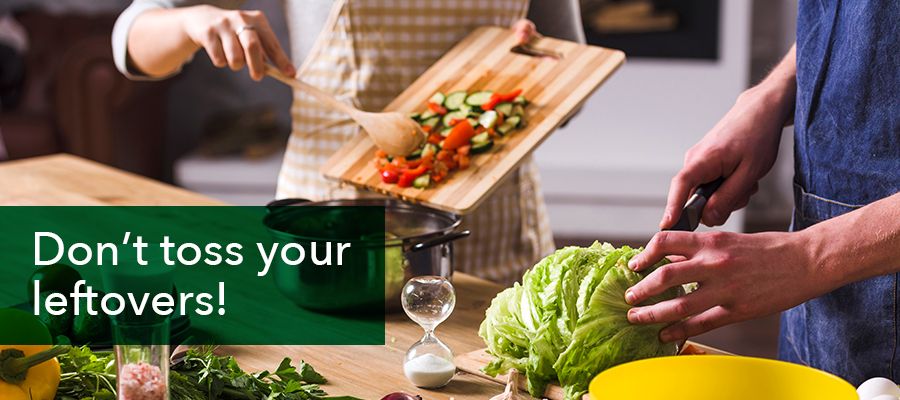 Photo of a family chopping vegetables on a chopping board