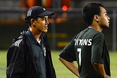Photo of Hidalgo on a soccer field coaching