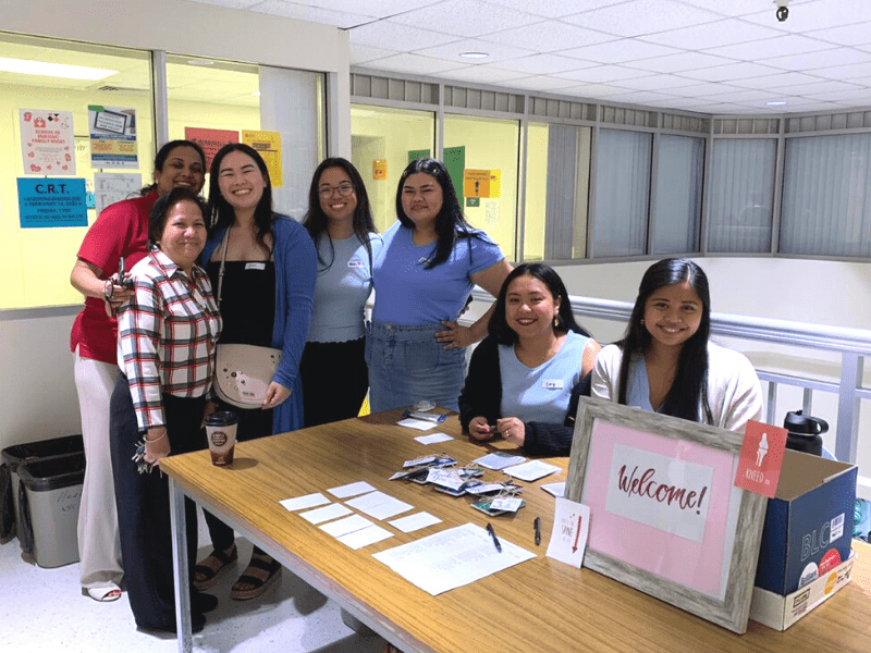 Reggie Mae Dionisio with fellow classmates and UOG faculty