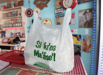 A takeout order in styrofoam and plastic packaging