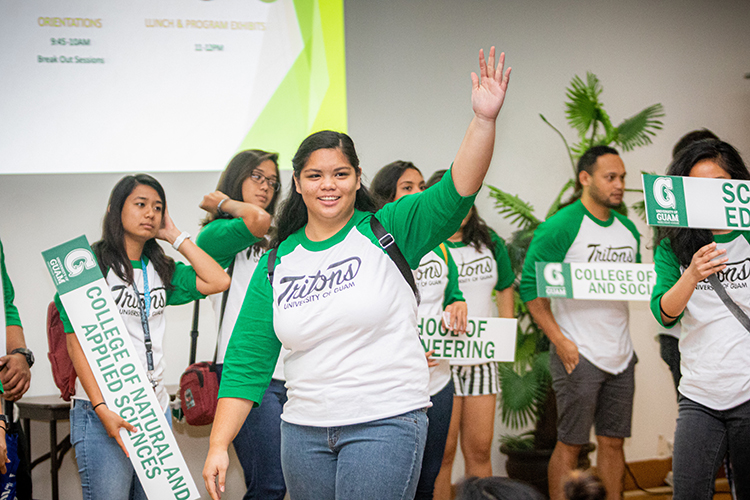 University of Guam student Kateri Santos helps welcome new students to campus at an orientation event in January.