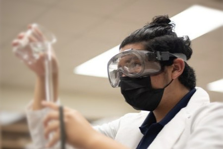 Students from competed in the experimental-based exercise at the UOG Science Building.