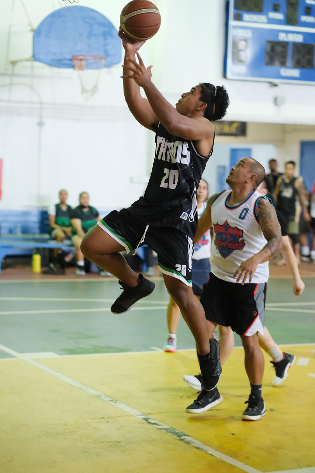 Basketball player jumping for a shot