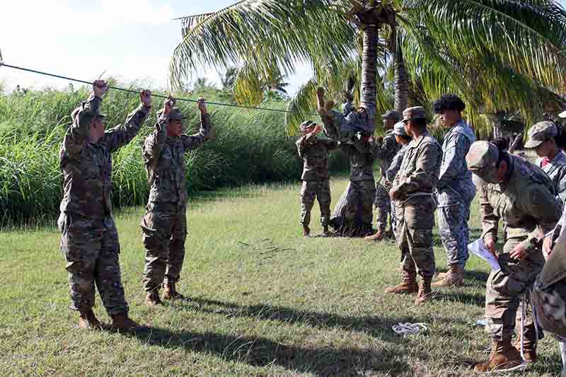 University of Guam ROTC cadets train the Tinian High School Junior ROTC cadets
