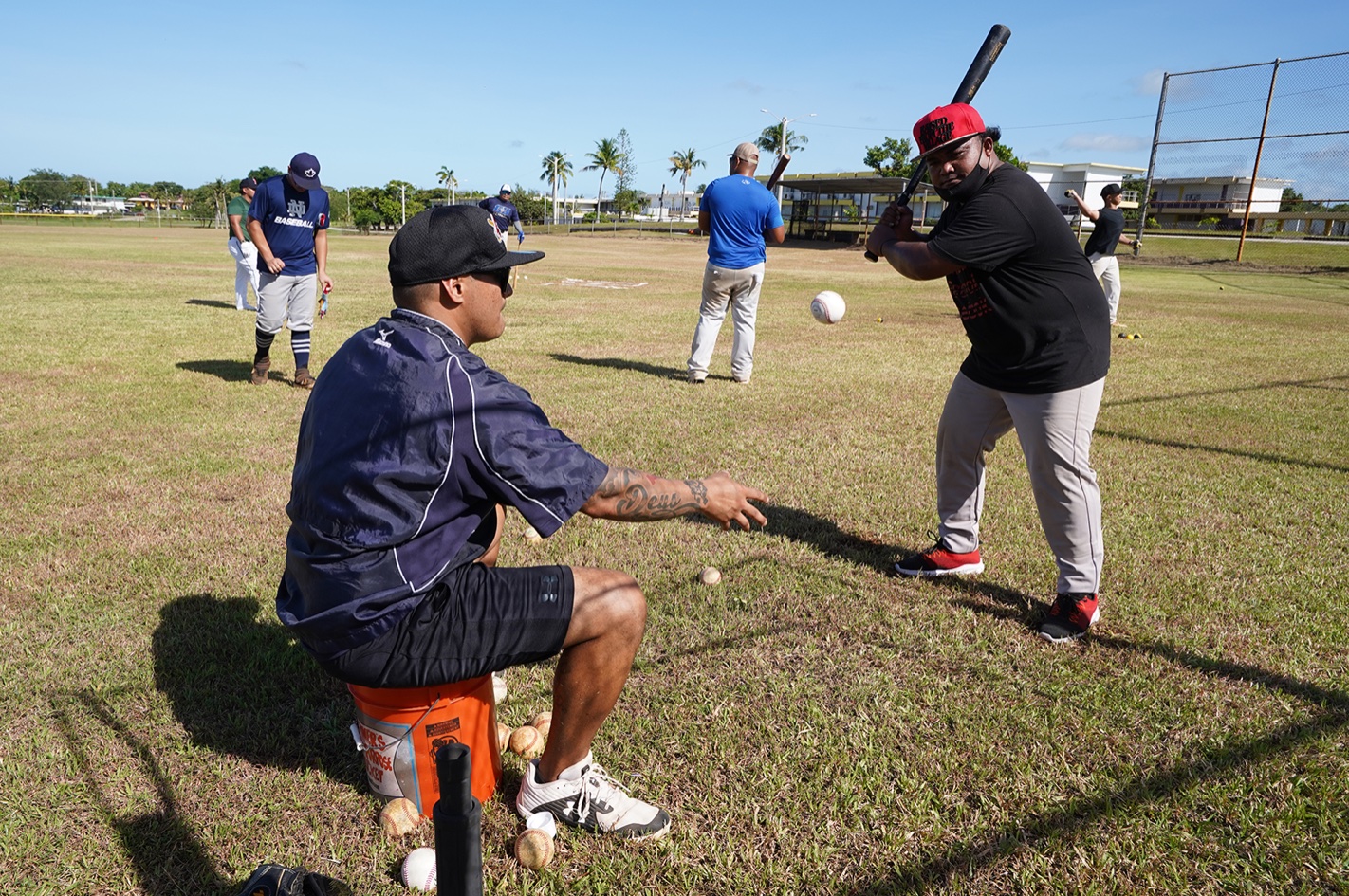 Photo of Coach Roke Alcantara Jr. and McHiver Williams