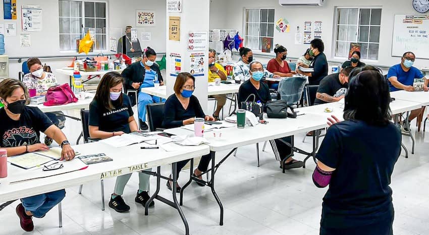 Caregivers and residents at the Macheche Community Center