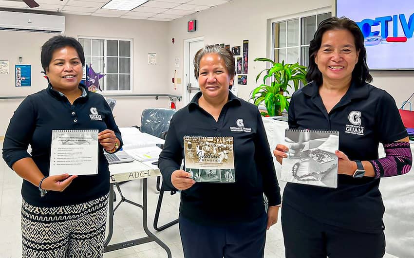 Photo of a certified caregiver shares an image of a wedding on Guåhan to a resident at the Macheche Community Center.