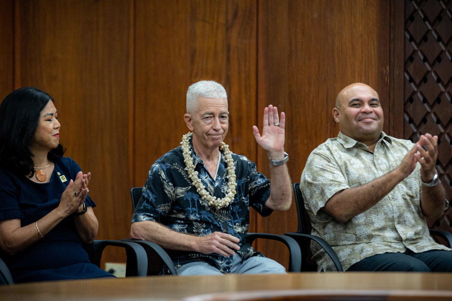 John W. Jenson responds to applause at a Sept. 26 ceremony