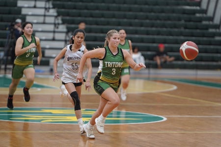 The Lady Tritons of the University of Guam got behind early but came-back to defeat the BallHers.