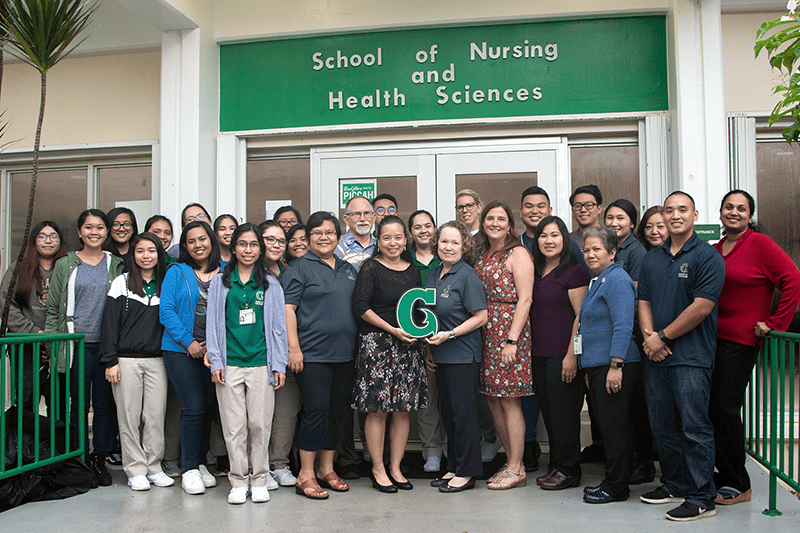 Photo of Dr. Hattori-Uchima with Margaret Perez Hattori-Uchima School of Health faculty/staff