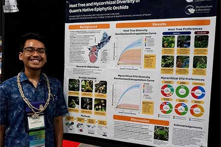 Michael Fernandez was honored for his “standout” poster presentation on Guam’s epiphytic orchids. 