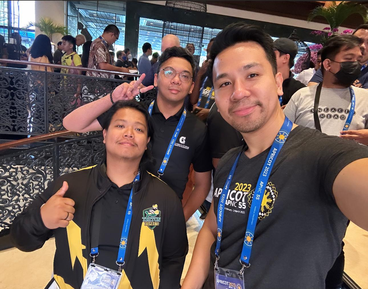 Group photo of Jose Santiago, Randy Dahilig, and Karl Lacanilao at the 2023 APRICOT