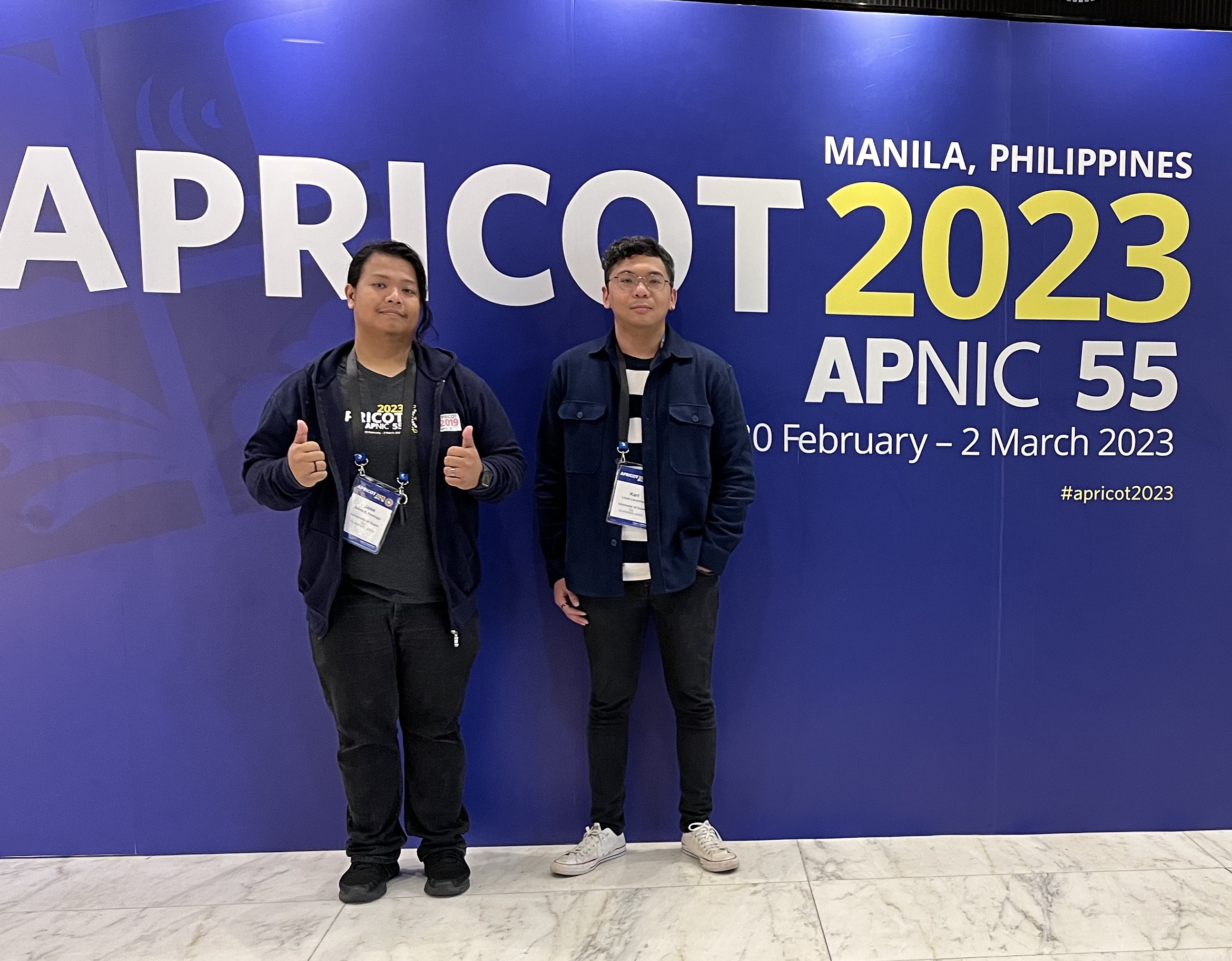 Photo of Jose Santiago and Karl Lacanilao at the 2023 APRICOT