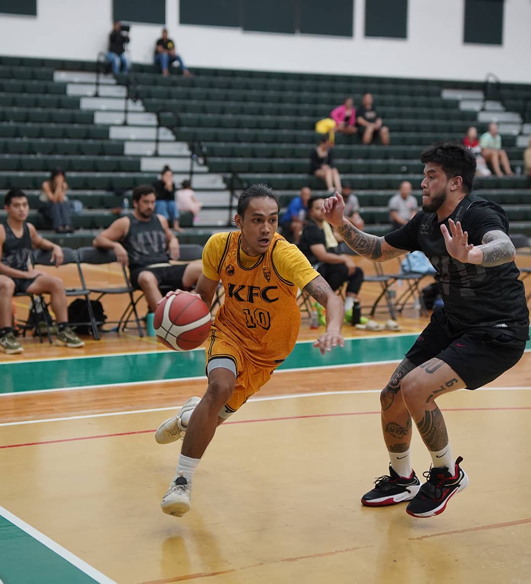 Chris Conner dribbles past Darren Hechanova