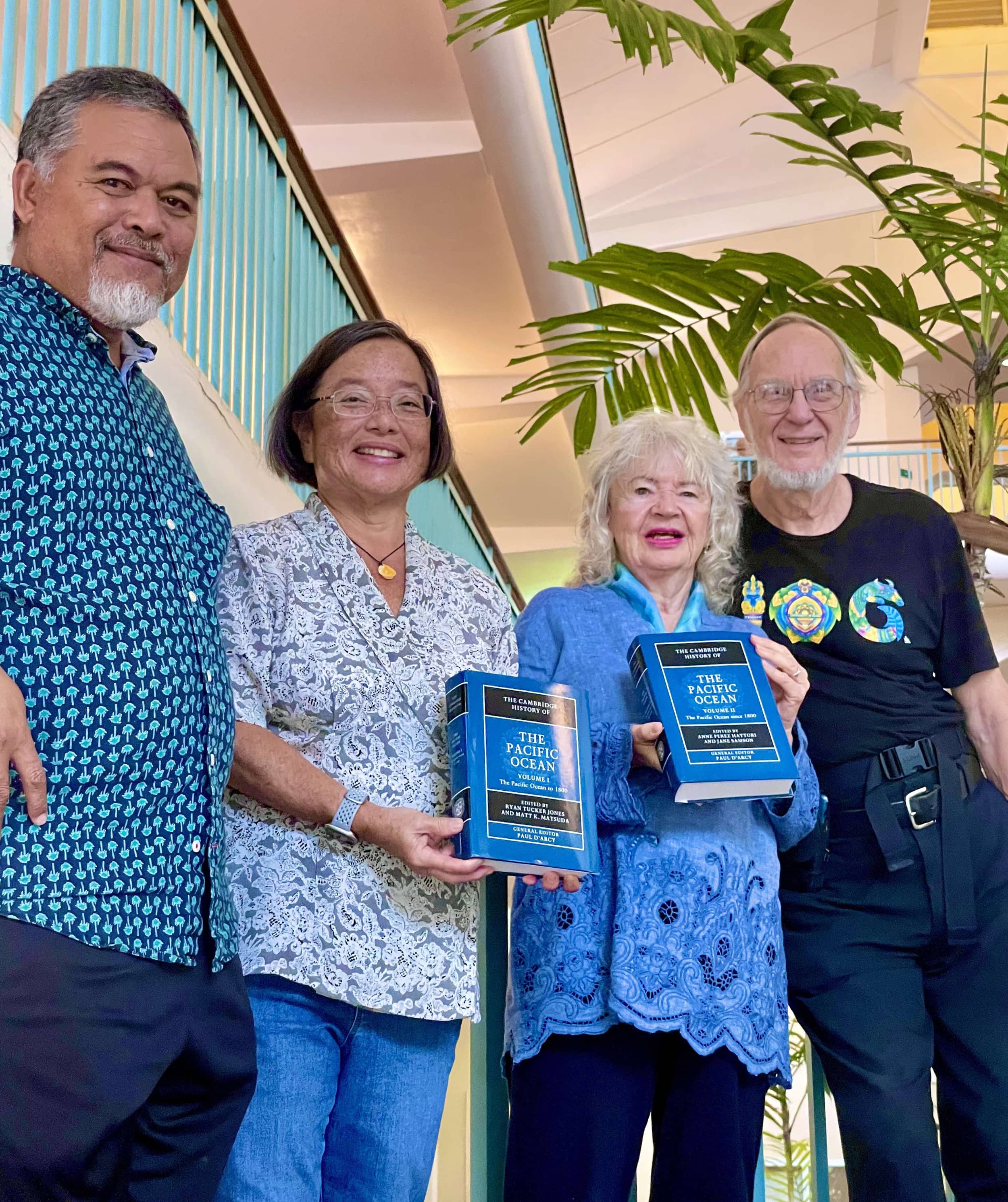 Group photo of Larry Raigetal, Dr. Anne Perez Hattori, Maria Schefter, and Dr. Christopher Lobban