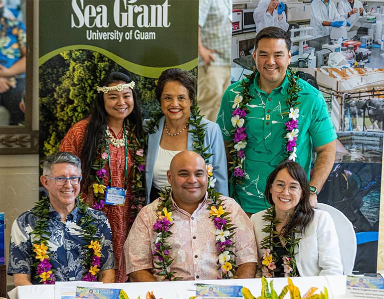 Conference on Island Sustainability guest speaker and members pose for a photo