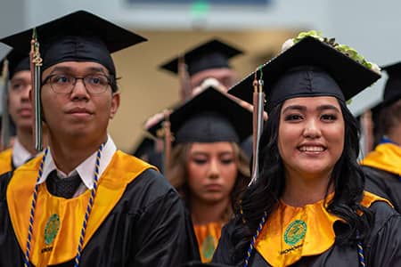 Graduates at UOG commencement