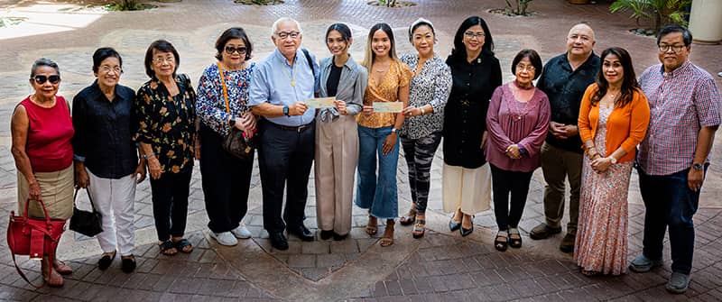 Scholarship recipients and Filipino-American President’s Club of Guam members 