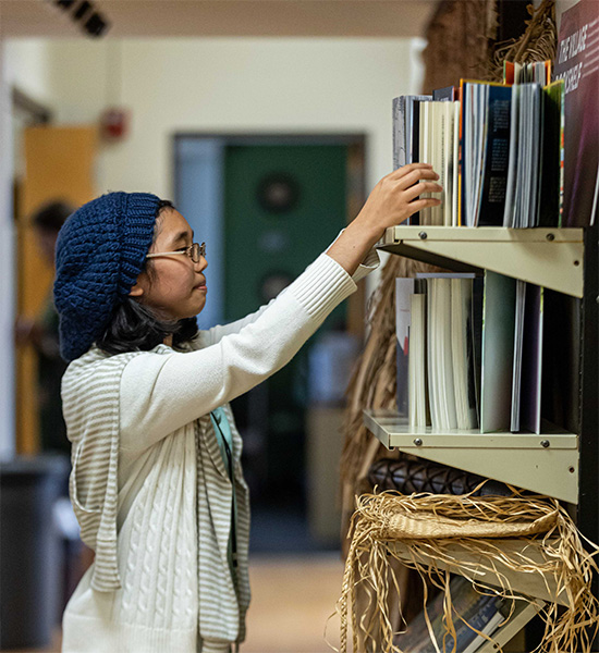 Young intern works on files at Micronesian Area Research Center