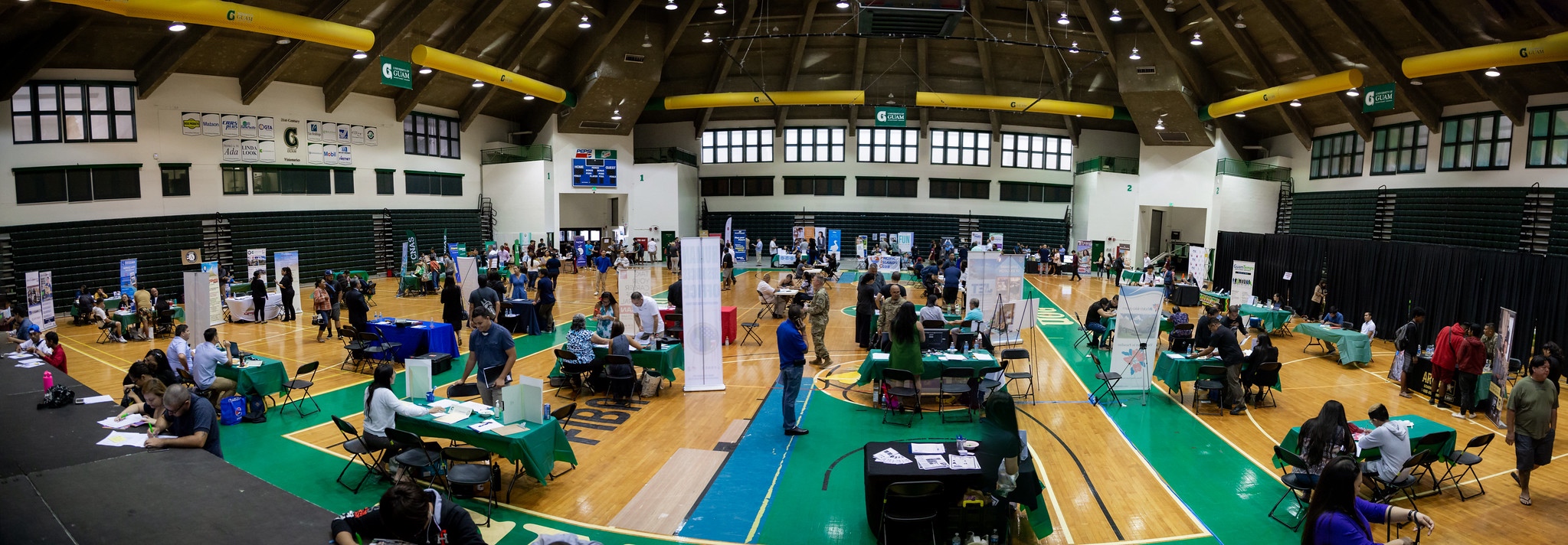 A job fair at the University of Guam Calvo Field House is held in 2019. Another job fair, scheduled for April 28, will have more than 50 employers participating.