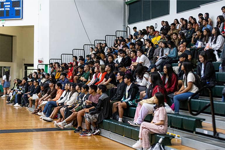 UOG Fieldhouse bleachers are filled with incoming UOG freshmen for new student orientation